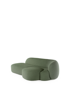 A green AALAND sofa with a soft, organic shape and a small attached seat, designed by Patricia Urquiola.
Fabric upholstered polyurethane