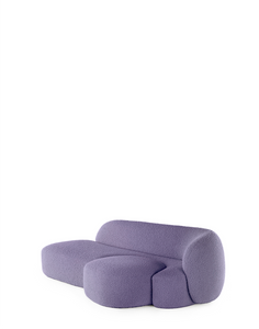 A purple AALAND sofa with a soft, organic shape and a small attached seat, designed by Patricia Urquiola.
Fabric upholstered polyurethane