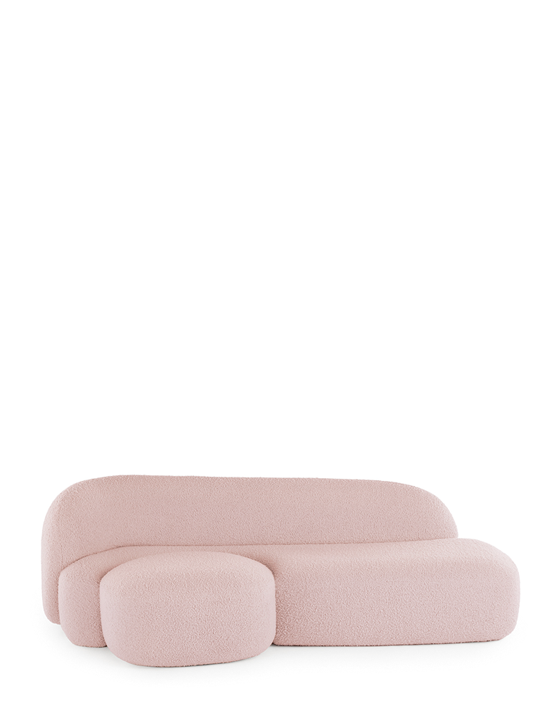 A pink AALAND sofa with a soft, organic shape and a small attached seat, designed by Patricia Urquiola.
Fabric upholstered polyurethane